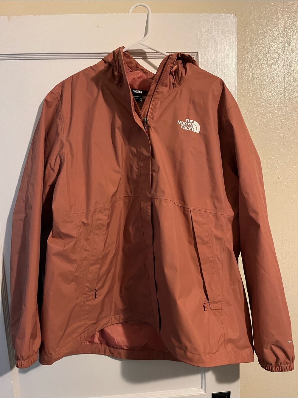The North Face Women’s coral-Colored Waterproof Hooded Rain Jacket